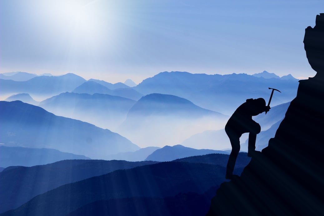 A Hiker Climbing